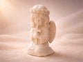 Praying Girl Angel Holding a Cross